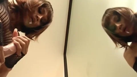 Redhead Ladyboy In dark underware Sucks A sex toy By The Mirror